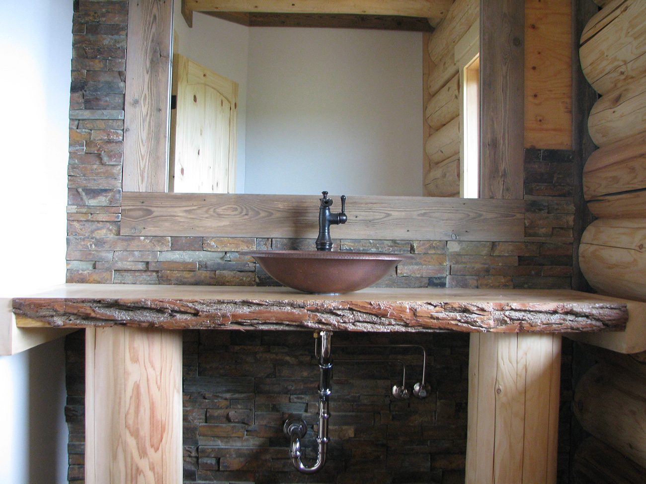 Custom rustic vanity with vessel sink